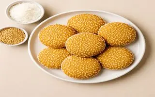 طرز تهیه شیرینی کنجدی نارگیلی